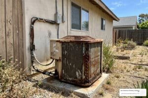 is it worth fixing an old air conditioner